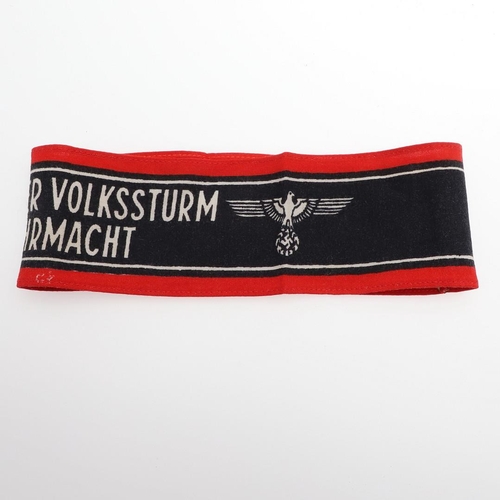 179 - A GERMAN SECOND WORLD WAR HOME GUARD 'DEUTSCHER VOLKSSTURM ' ARMBAND. A printed cotton armband 'Deut... 