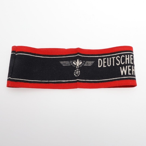 179 - A GERMAN SECOND WORLD WAR HOME GUARD 'DEUTSCHER VOLKSSTURM ' ARMBAND. A printed cotton armband 'Deut... 