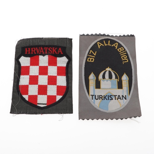 219 - TWO GERMAN FOREIGN VOLUNTEER ARM BADGES. Two foreign volunteer armbadges, Turkistan 'BIZ ALLA Billen... 