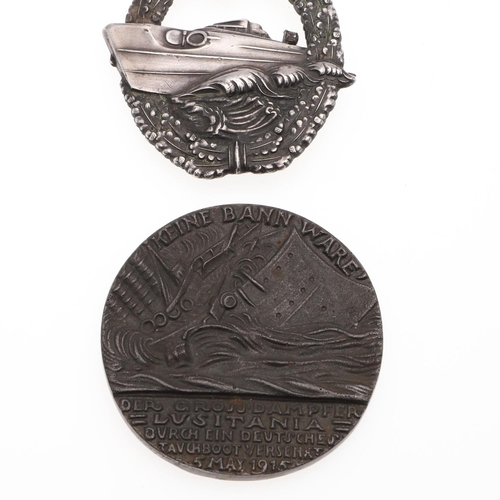 223 - A KRIEGSMARINE 2ND TYPE E-BOAT BADGE AND A LUSITANIA MEDAL. A 2nd type E boat badge with torpedo boa... 