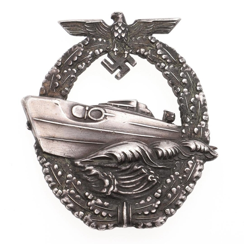 223 - A KRIEGSMARINE 2ND TYPE E-BOAT BADGE AND A LUSITANIA MEDAL. A 2nd type E boat badge with torpedo boa... 