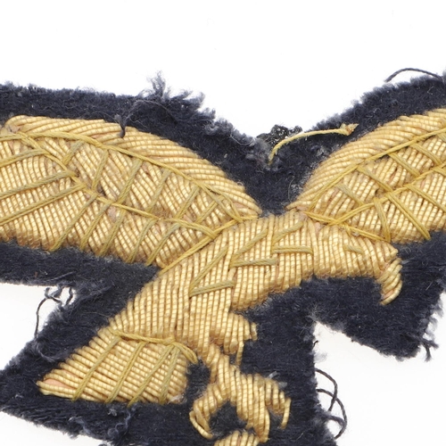 227 - A LUFTWAFFE GENERAL'S BREAST EAGLE. A gold bullion type breast eagle with a flying eagle with swasti... 