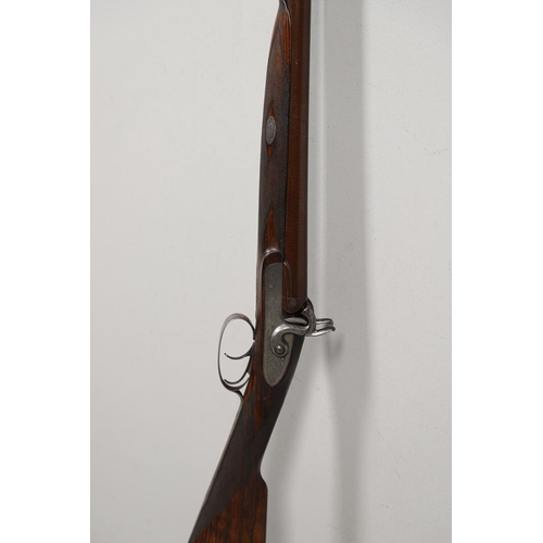 23 - A FINE 19TH CENTURY 12 BORE SPORTING GUN BY SQUIRES OF LONDON. With twin 74.5cm Damascus barrels, mu... 