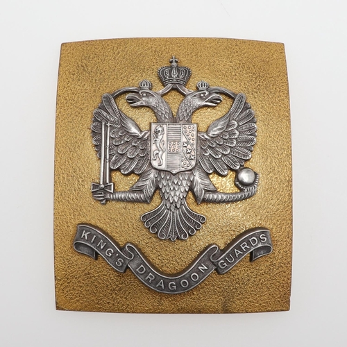 231 - A 1ST KING'S DRAGOON GUARDS BELT PLATE. A convex brass belt plate mounted with double headed eagle a... 