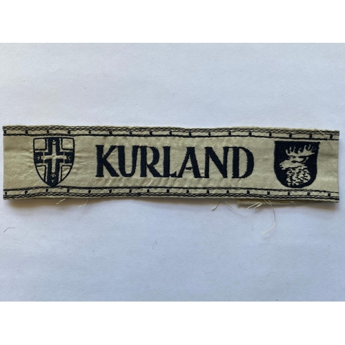 234 - A SECOND WORLD WA GERMAN 'KURLAND' CUFFBAND. A Second World War German Army 'Kurland' Cuffband, very... 