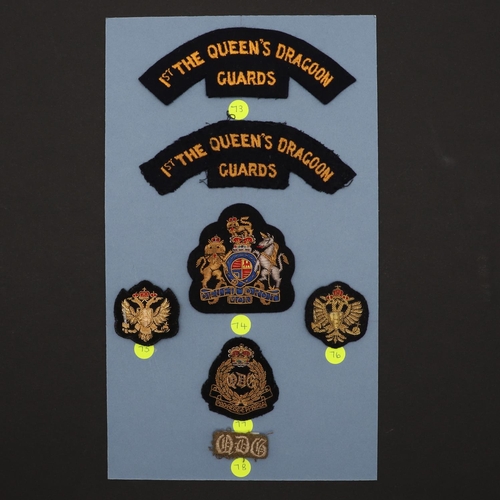 235 - A COLLECTION OF 1st QUEEN'S DRAGOON GUARDS CLOTH PATCHES. An interesting and well presented collecti... 