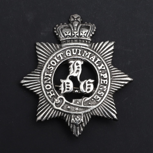 236 - AN UNUSUAL VICTORIAN UNMARKED SILVER PAGRI BADGE FOR THE KING'S DRAGOON GUARDS. An eight pointed sta... 