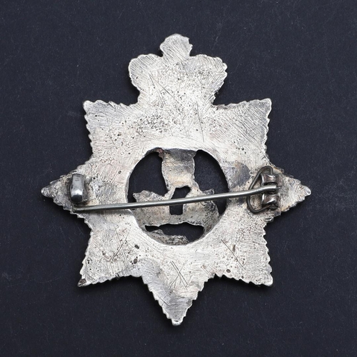 236 - AN UNUSUAL VICTORIAN UNMARKED SILVER PAGRI BADGE FOR THE KING'S DRAGOON GUARDS. An eight pointed sta... 