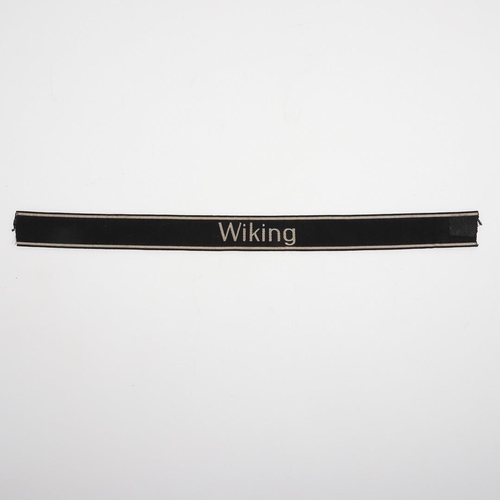 237 - A SECOND WORLD WAR GERMAN 'WIKING' CUFF TITLE. A machine embroidered cuff title 'Wiking' in white ag... 