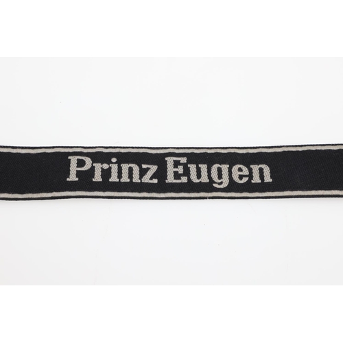 238 - A SECOND WORLD WAR GERMAN 'PRINZ EUGEN' CUFF TITLE. A machine embroidered cuff title 'Prinz Eugen' i... 