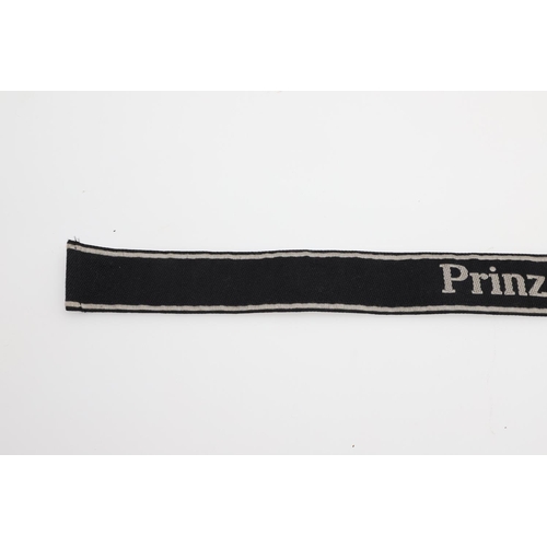 238 - A SECOND WORLD WAR GERMAN 'PRINZ EUGEN' CUFF TITLE. A machine embroidered cuff title 'Prinz Eugen' i... 