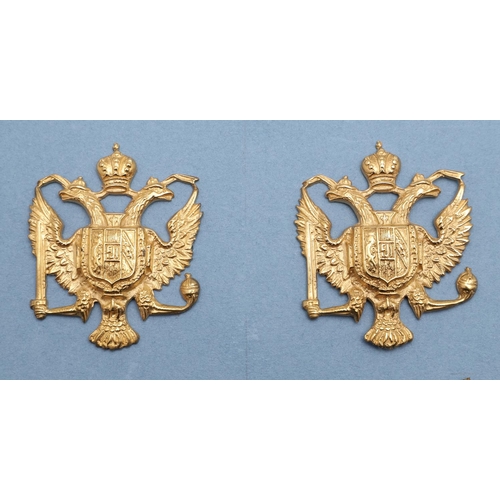 247 - AN INTERESTING COLLECTION OF EIGHT 1ST KING'S DRAGOON GUARDS CAP AND COLLAR BADGES. A collection of ... 