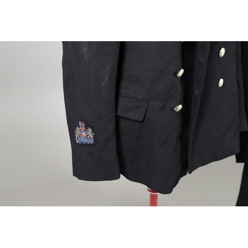 249 - A COLLECTION OF POST SECOND WORLD WAR NAVAL UNIFORM. A collection of Uniform comprising a two pocket... 