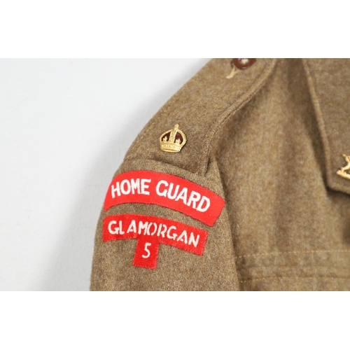 250 - A GLAMORGAN HOME GUARD BATTLE DRESS BLOUSE AND TROUSERS. An interesting Glamourgan Battledress, the ... 