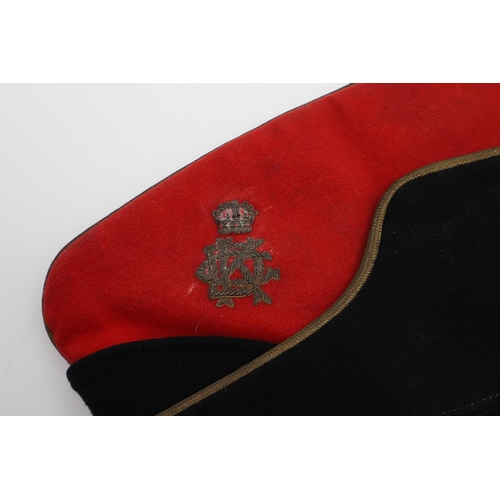 252 - A KINGS DRAGOON GUARDS OFFICERS FIELD SERVICE CAP. An Officers Field Service cap in black and red wi... 