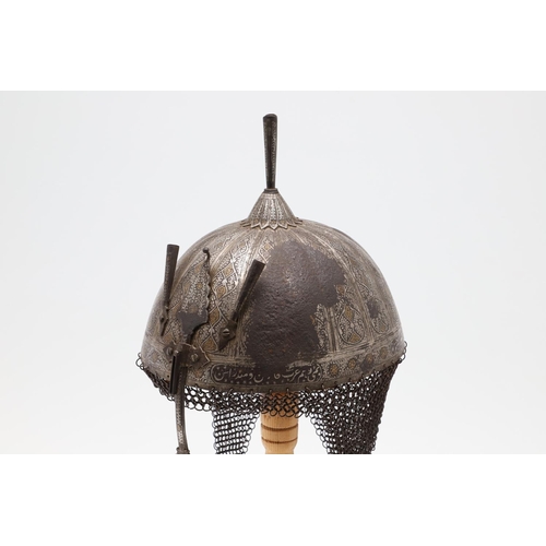 255 - A 19TH CENTURY INDO PERSIAN KULAH KHUD HELMET. With a decorative fluted bowl inlaid with scrolling s... 