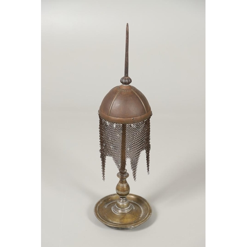 256 - A 19TH CENTURY INDO-PERSIAN KULAH KHUD HELMET. With an iron domed bowl with a 22cm spike to the top,... 