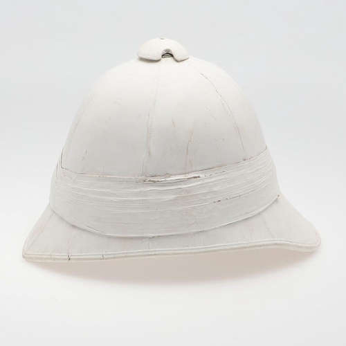 260 - A WOLSELEY PATTERN TROPICAL HELMET. A Wolseley pattern tropical helmet with white finish, pointed pe... 