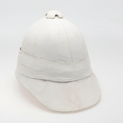 260 - A WOLSELEY PATTERN TROPICAL HELMET. A Wolseley pattern tropical helmet with white finish, pointed pe... 