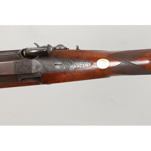 27 - A FINE 19TH CENTURY 4 BORE SINGLE BARREL SPORTING GUN BY GRIFFITHS. With an 88cm Damascus barrel, wi... 