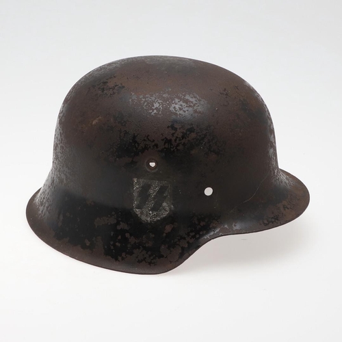 273 - A BLACK WAFFEN SS SINGLE DECAL M42 HELMET. A Second World War or later M42 type helmet shell, with w... 