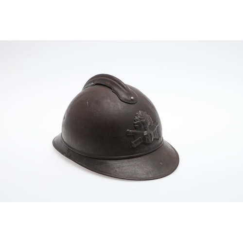 275 - A FRENCH FIRST WORLD WAR M15 ADRIAN STEEL HELMET. A Great War period French Artillery M15 pattern st... 