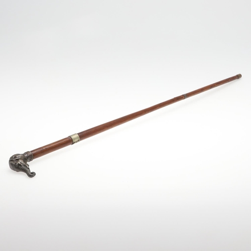 282 - A WLAKING STICK WITH SHAFT FROM TIMBER FROM H.M.S. FOUDROYANT. A walking stick with 81cm shaft with ... 