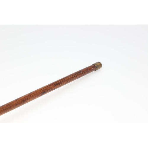 282 - A WLAKING STICK WITH SHAFT FROM TIMBER FROM H.M.S. FOUDROYANT. A walking stick with 81cm shaft with ... 