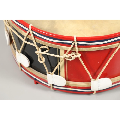 285 - A REGIMENTAL BASS DRUM FOR THE NORTH STAFFORDSHIRE REGIMENT. A 74cm military bass drum painted with ... 