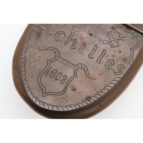 298 - A PRE FIRST WORLD WAR TOBACCO BOX FROM H.M.S. ACHILLES. A copper tobacco box of oval concave form wi... 