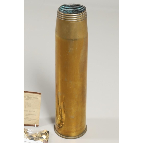 299 - A COLLECTION OF ROYAL NAVY BUTTONS AND INSIGNIA AND A LARGE SHELL CASING. A large polished brass she... 