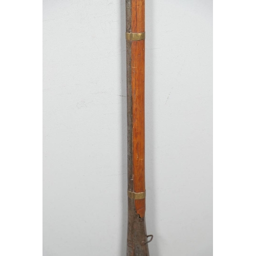 31 - A 19TH CENTURY INDIAN MATCHLOCK WITH JAIPUR ARMOURY MARKS. With a 105cm barrel with flared decorated... 