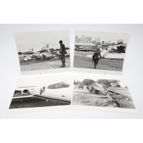 312 - A COLLECTION OF TWENTY FOUR PHOTOGRAPHS OF 'OPERATION JUST CAUSE', PANAMA 1989/1990.  A collection o... 