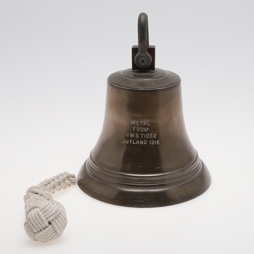 329 - A BRONZE SHIPS BELL MADE WITH METAL FROM HMS TIGER, JUTLAND 1916. A finely cast bell stamped 'METAL ... 