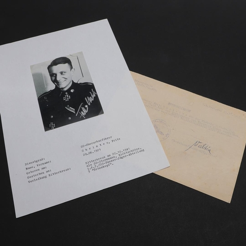 330 - AN OFFICIAL NOTIFICATION OF THE AWARD OF THE KNIGHT'S CROSS TO STORMTROOPER FRITZ CHRISTEN. A docume... 