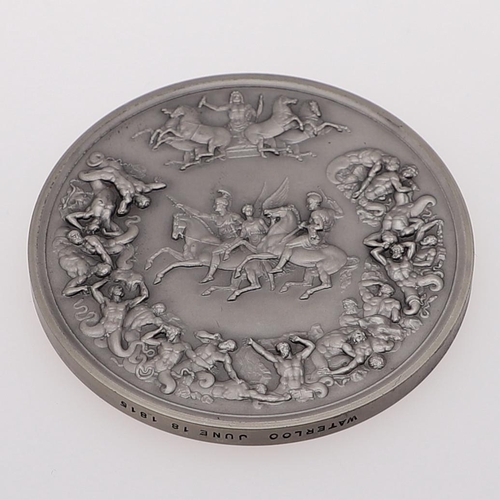 355 - PISTRUCCI WATERLOO MEDAL BY JOHN PINCHES. A silver medal commemorating the Battle of Waterloo, a red... 