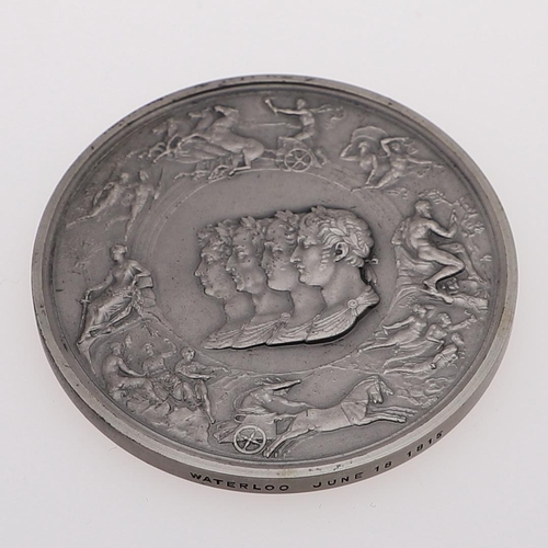 355 - PISTRUCCI WATERLOO MEDAL BY JOHN PINCHES. A silver medal commemorating the Battle of Waterloo, a red... 