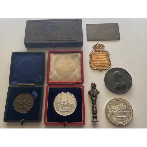 360 - A COLLECTION OF NAVAL AND SHIPPING RELATED HISTORIC MEDALS AND ARTEFACTS. A white metal medal of H.I... 