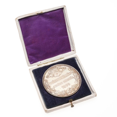 377 - A PRESENTATION MEDAL FOR THE SZEKESFEHERVARI NATIONAL EXHIBITION OF 1879. An award or souvenir medal... 