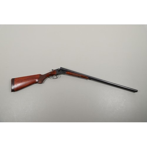 52 - A RUSSSIAN BIAKAL 12 BORE DOUBLE BARREL EJECTOR SHOTGUN. With 72.5cm side by side barrels numbered B... 