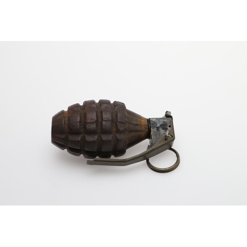 58 - A USA MK 2 'PINEAPPLE' GRENADE. An American MkII grenade with later sprung fuse and lever. Marked A ... 