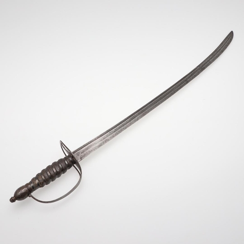 69 - A LATE 18TH OR EARLY 19TH CENTURY SLOTTED HILT SABRE. With a 67cm curved pointed blade with twin ful... 