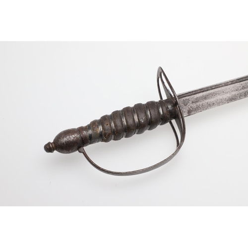 69 - A LATE 18TH OR EARLY 19TH CENTURY SLOTTED HILT SABRE. With a 67cm curved pointed blade with twin ful... 