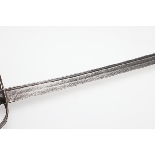 69 - A LATE 18TH OR EARLY 19TH CENTURY SLOTTED HILT SABRE. With a 67cm curved pointed blade with twin ful... 