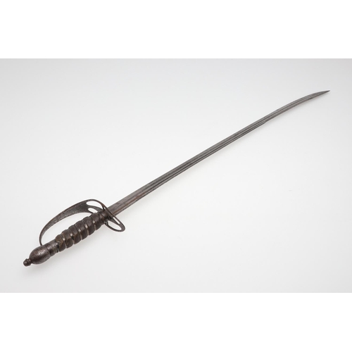 69 - A LATE 18TH OR EARLY 19TH CENTURY SLOTTED HILT SABRE. With a 67cm curved pointed blade with twin ful... 