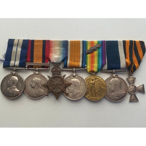 401 - A DISTINGUISHED SERVICE MEDAL GROUP OF SEVEN TO A CHIEF PETTY OFFICER AT THE BATTLE OF JUTLAND. A gr... 