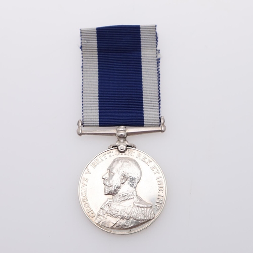 428 - A GEORGE V ROYAL NAVY LONG SERVICE AND GOOD CONDUCT AWARD TO H.M.S. ARIADNE. A George V Royal Navy L... 