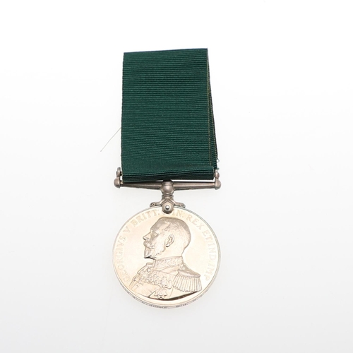 434 - A GEORGE V ROYAL NAVAL RESERVE LONG SERVICE AND GOOD CONDUCT MEDAL. A George V Royal Naval Reserve L... 