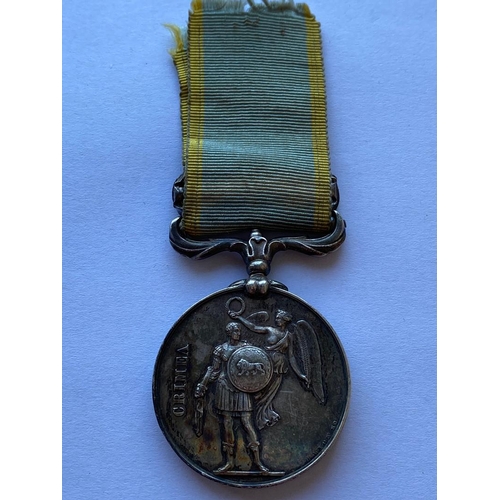 456 - A CRIMEA MEDAL WITH SEBASTOPOL CLASP TO THE EARL OF ULSTER'S REGIMENT OF FOOT. Named to 1054 Pte P. ... 