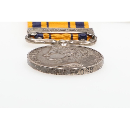 458 - A SOUTH AFRICA MEDAL WITH 1877-9-9 CLASP. A South Africa Medal with 1877-8-9 Clasp renamed to 'John ... 